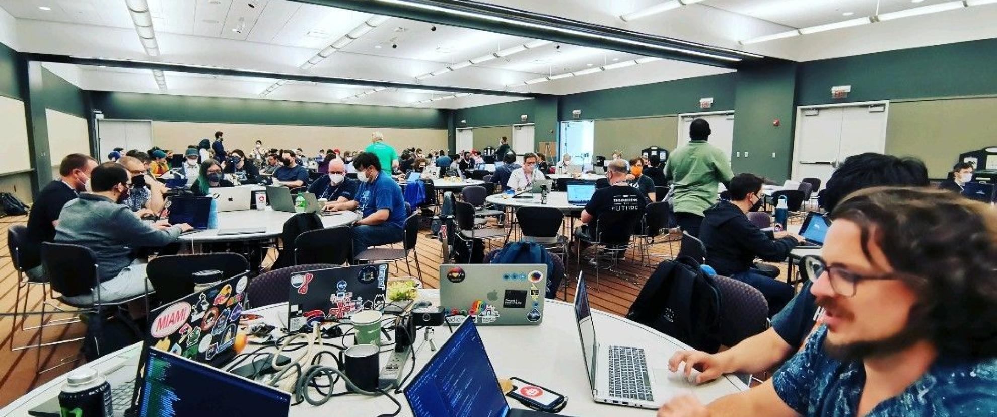 Jon at the DrupalCon Contrib room Site Audit Table.